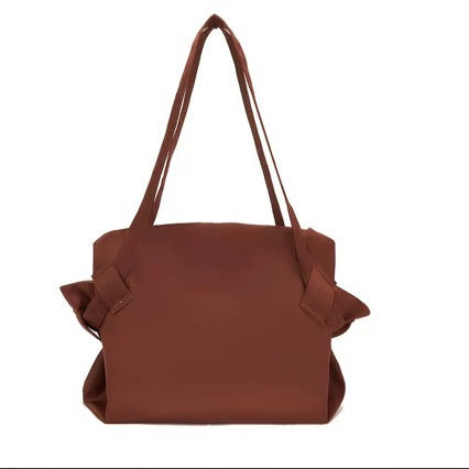 Open duffel bag showing nylon lining and zippered interior pocket for organized storage