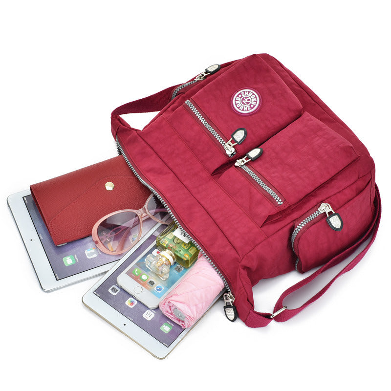 Practical women's casual shoulder bag made from durable nylon fabric for daily wear.