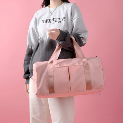 Large capacity waterproof travel duffel bag made from durable Oxford cloth for weekend trips and gym use.