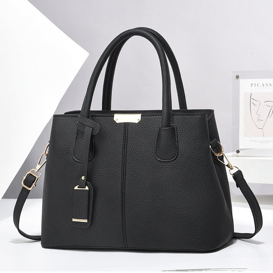 Front view of women's large PU leather tote crossbody handbag