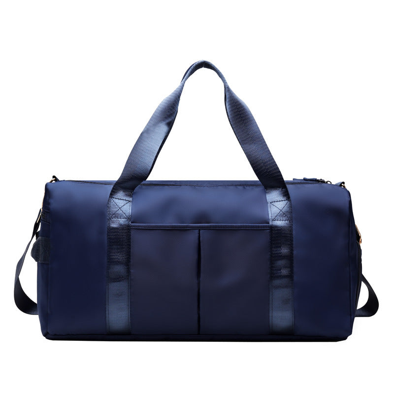 Large waterproof fitness bag designed for gym gear, workout clothes, and weekend travel essentials.
