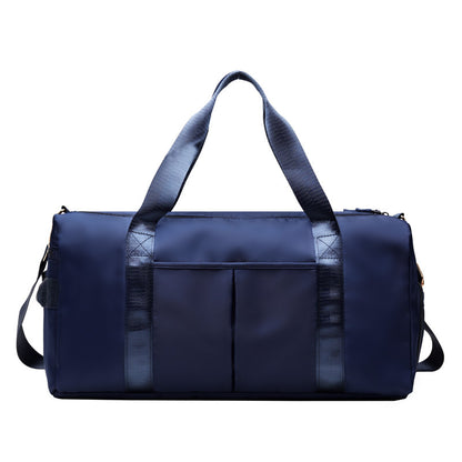 Large waterproof fitness bag designed for gym gear, workout clothes, and weekend travel essentials.