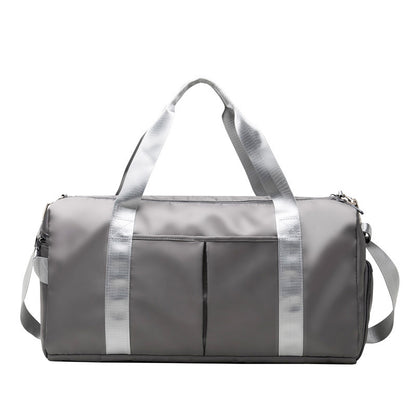 Lightweight waterproof weekender bag with spacious interior for clothing, shoes, and travel essentials.