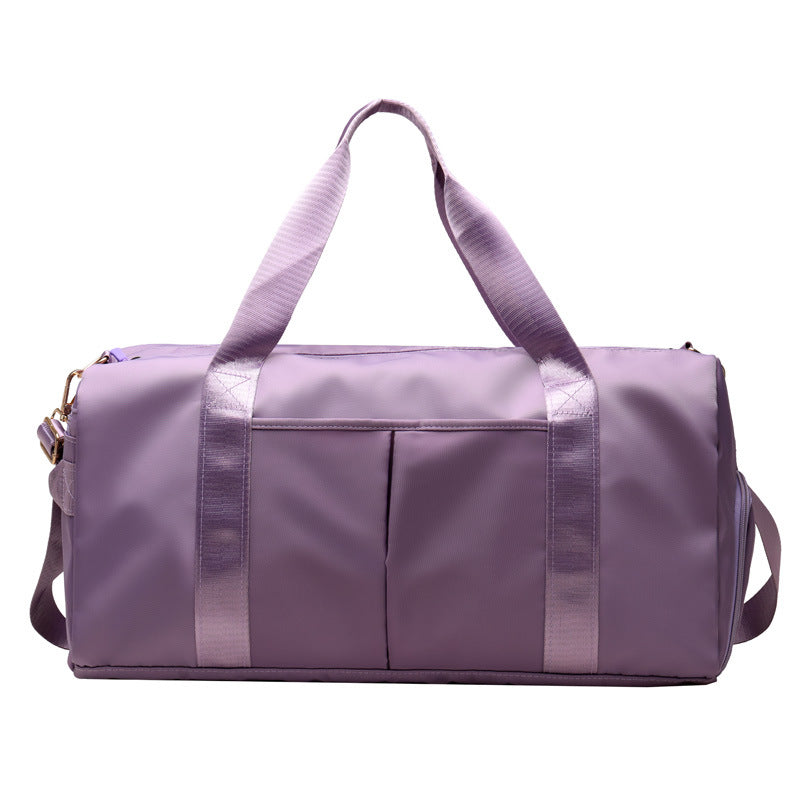 Comfortable travel duffel bag featuring soft carry handles and an adjustable shoulder strap.