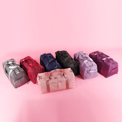 Stylish waterproof duffel bag suitable for both women and men for gym, travel, and sports activities.