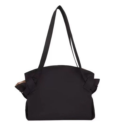 Black Oxford cloth duffel bag with horizontal rectangular shape and dual shoulder straps
