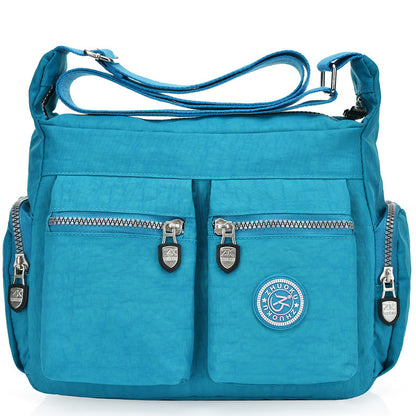 Women's nylon crossbody bag available in black, purple, dark blue, blue, wine red, and red.