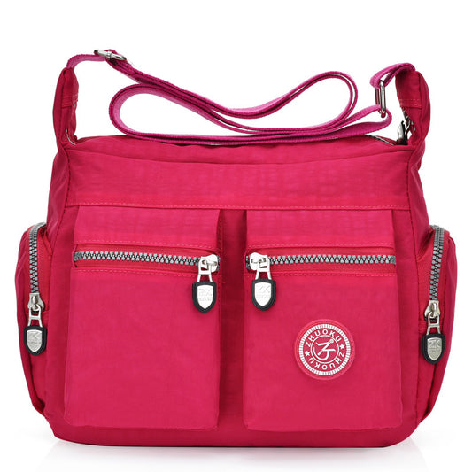 Women's lightweight nylon casual shoulder crossbody bag for everyday use in black color.