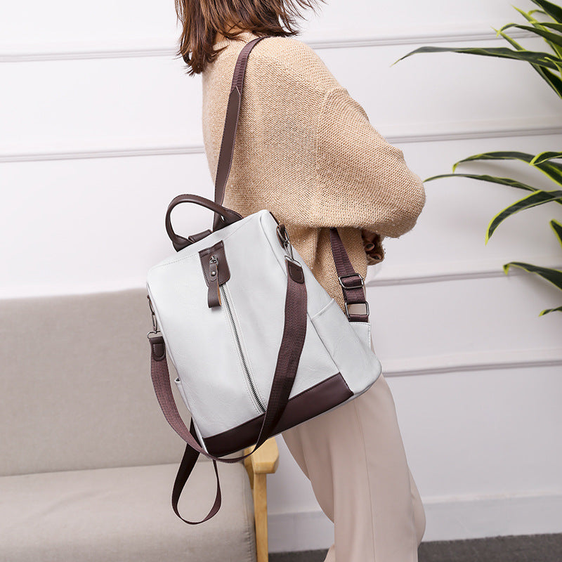 Stylish women's soft leather travel backpack featuring a secure anti-theft design and spacious interior.