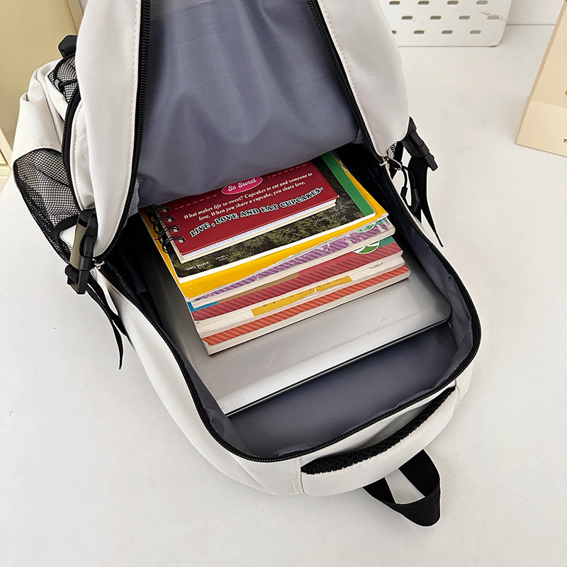 Polyester-lined interior compartment of 20-35L school backpack