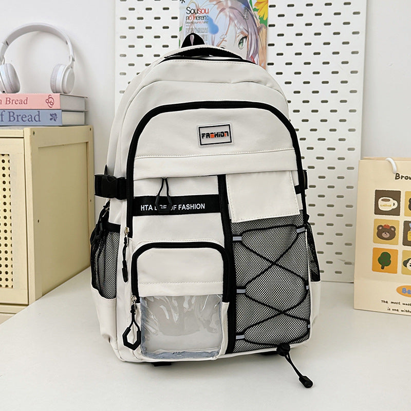 Side view of unisex nylon backpack showing curved shoulder strap system
