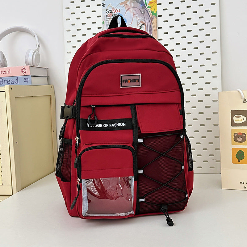Student wearing load-reducing curved-strap backpack for daily use