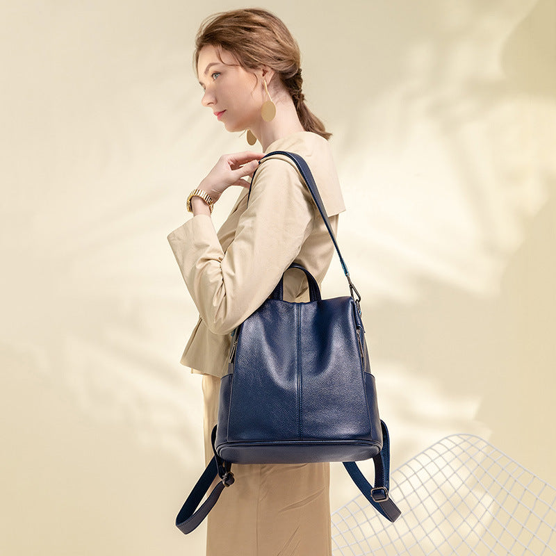 Close-up of concealed anti-theft pocket on soft leather backpack