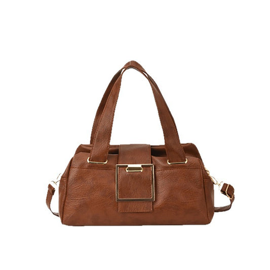Side profile of structured horizontal square PU leather handbag